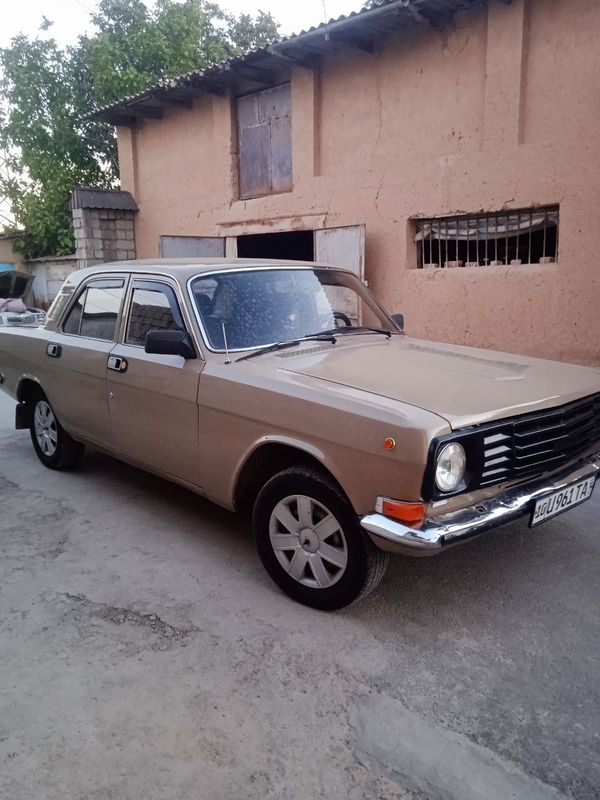 Автомобиль газ 2411