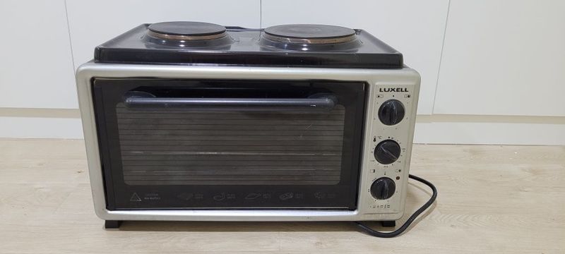 Комбинированная мини духовка и мини плита. Фирма Luxell Комбинированная мини духовка и мини плита. Фирма Luxell