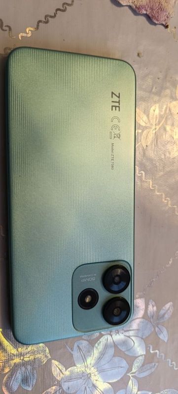 ZTE 7060 Телефон ZTE 7060 Телефон