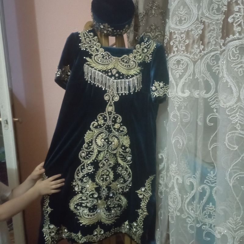 бир икки марта кийилган холати янги