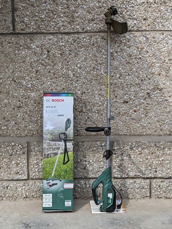 Продаётся электрический триммер (газонокосилка) BOSCH AFS 23-37. Продаётся электрический триммер (газонокосилка) BOSCH AFS 23-37.