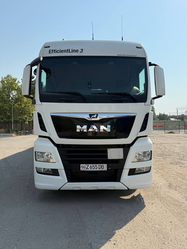 MAN TGX EURO 6 + KOGEL прицеп саф мост лентайка сотилади MAN TGX EURO 6 + KOGEL прицеп саф мост лентайка сотилади