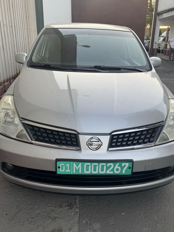 Tiida Nissan sotiladi 1,8 mator