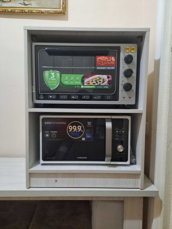 Duxovka va mikrato'lqinli pech uchun padstavka. Duxovka va mikrato'lqinli pech uchun padstavka.