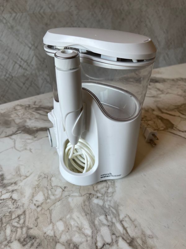 Очистка зубов Waterpik water flosser