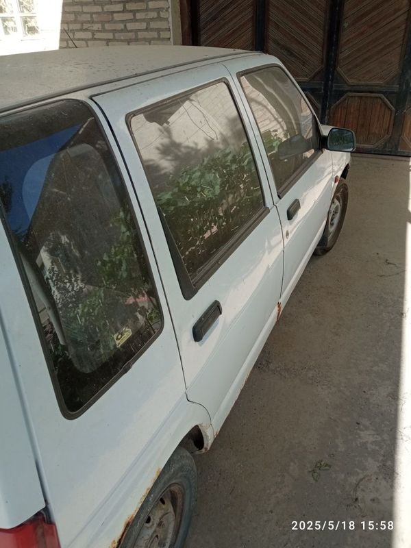 Tico oq rangda yili 2000 benzinda Tico oq rangda yili 2000 benzinda