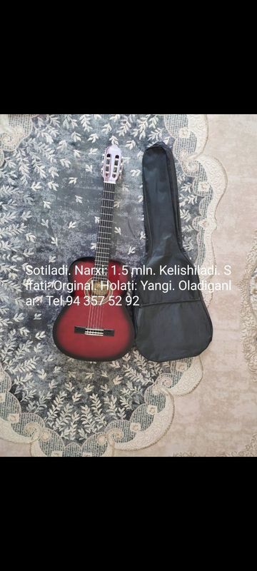 Yangi Gitara sotiladi Yangi Gitara sotiladi