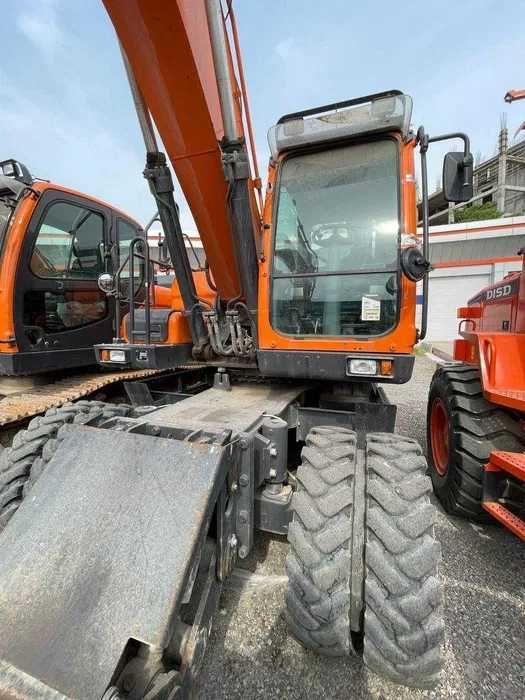 Продаётся колесный экскаватор Doosan 210 б.у состояние идеальное