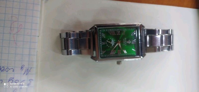 Часы Rolex. Зелёный цвет