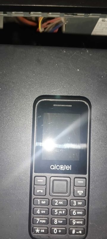 Кнопочный телефон Alcatel