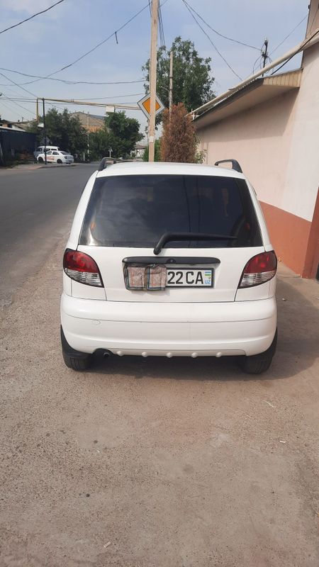 Sotiladi Matiz 2003 yil oq metani bor Sotiladi Matiz 2003 yil oq metani bor