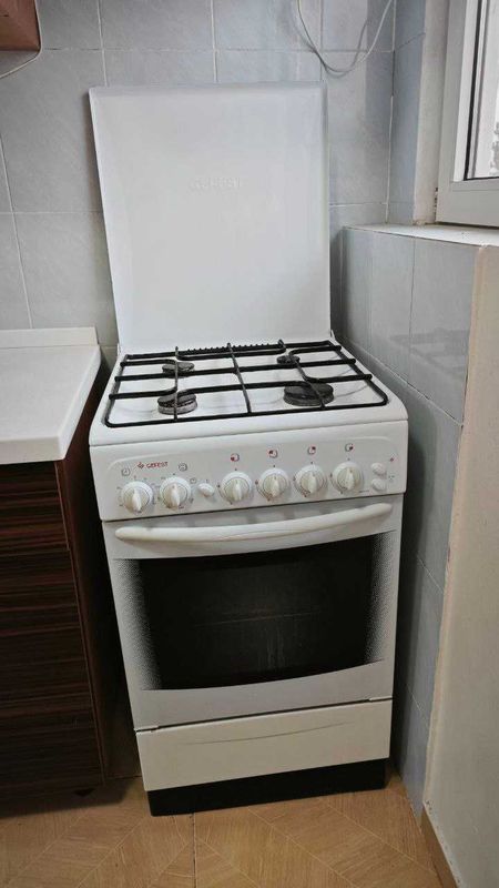 продается газовая плита Гефест с вытяжкой