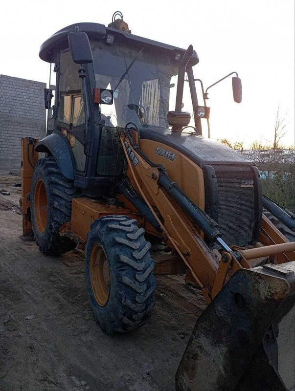 Экскаватор погрузчик сотилади CASE 570 T Экскаватор погрузчик сотилади CASE 570 T