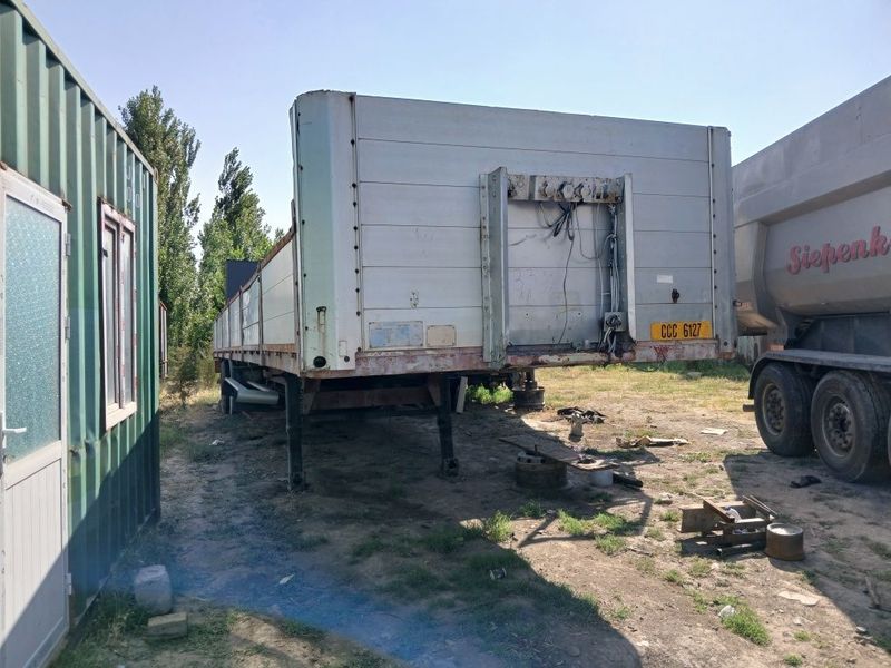 Прицепы, Schmitz SPR 27 yarim tirkama bortli Прицепы, Schmitz SPR 27 yarim tirkama bortli