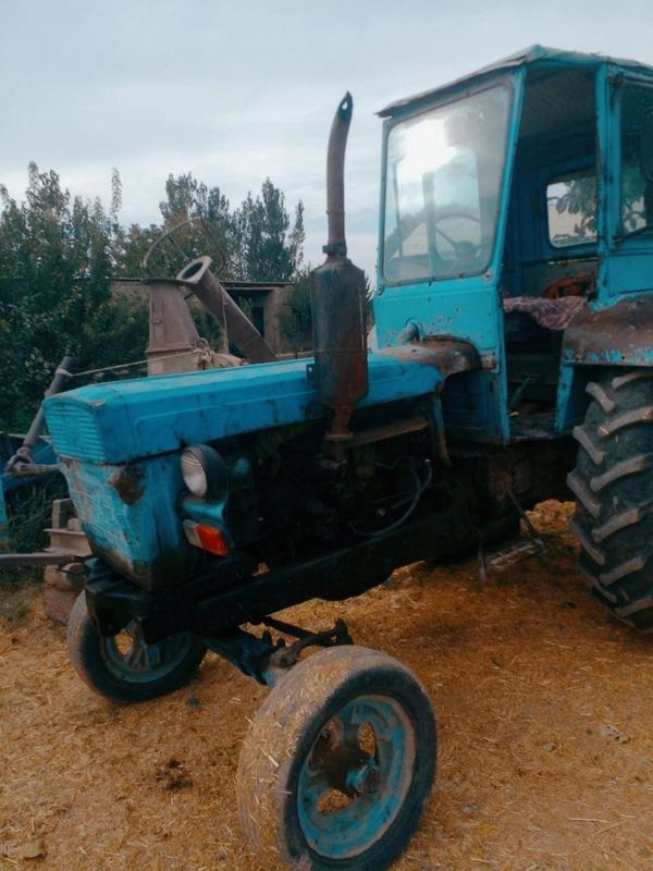 Traktor 28 ,dku kanbay va telichkasi bilan sotiladi Traktor 28 ,dku kanbay va telichkasi bilan sotiladi