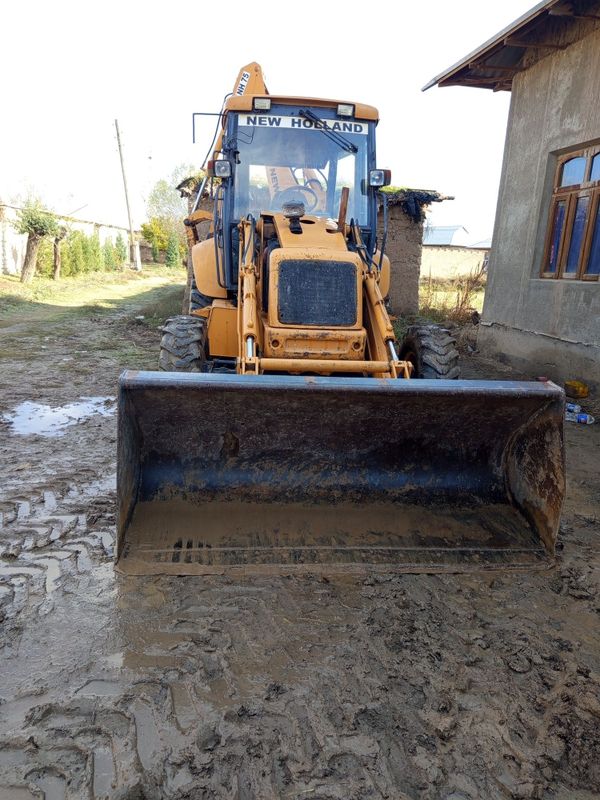 Экскаватор пагрузчик NEW HOLLAND 1998 еили холати зур