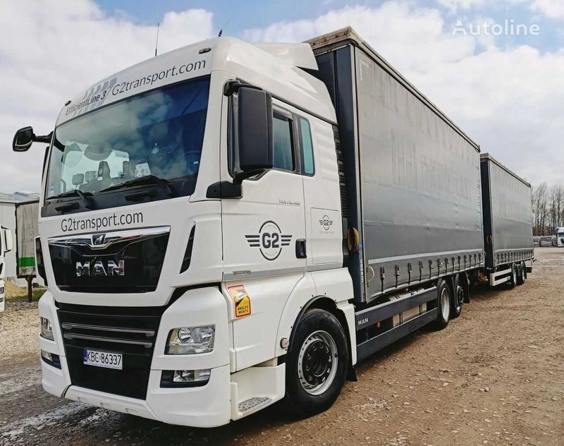 MAN TGX 26.460 XLX + прицеп штора