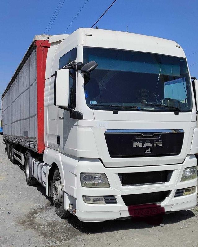 Тягач MAN TGX 2011 йил, автомат КПП, прицеп фрейхауф саф мост, 2009 й Тягач MAN TGX 2011 йил, автомат КПП, прицеп фрейхауф саф мост, 2009 й