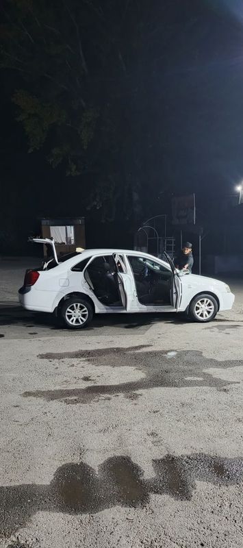 Lacetti 1.8 sotiladi Lacetti 1.8 sotiladi