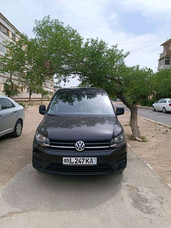 машина Volkswagen Caddy