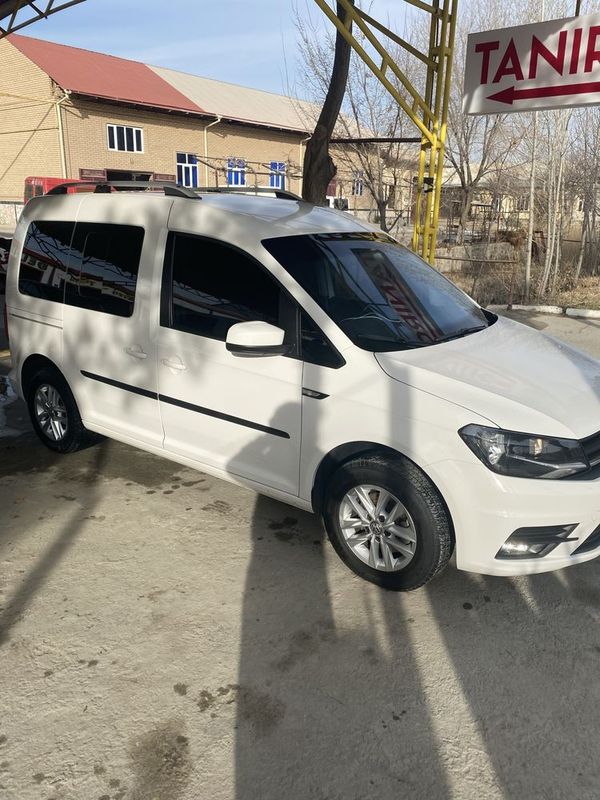 Продается Volkswagen Caddy Сотилади.тонировка имеется.тонировка бор