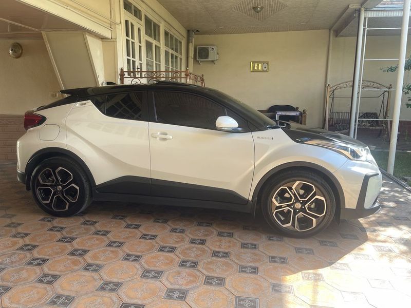 TOYOTA электромобили сотилади йили 2021 22 ранги оқ краскаси тоза TOYOTA электромобили сотилади йили 2021 22 ранги оқ краскаси тоза