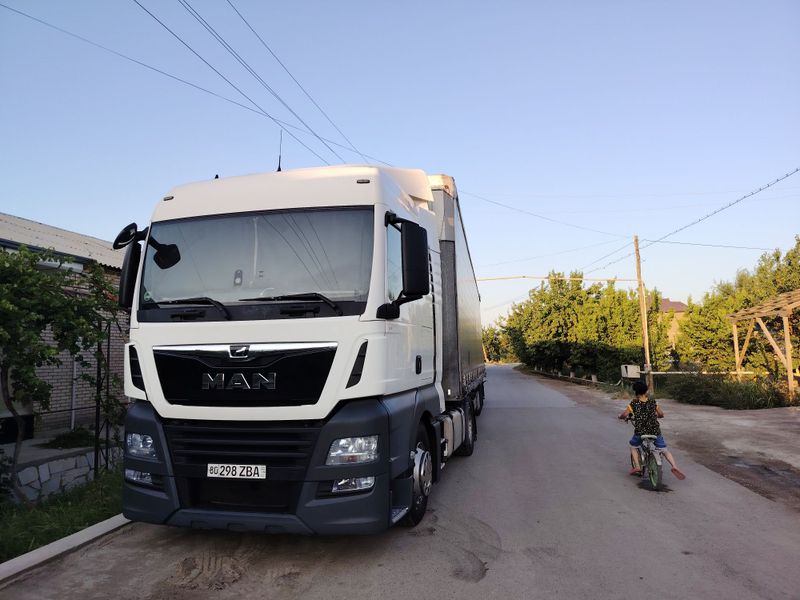 MAN TGX 18.460 EURO 6 + SCHMITZ прицеп Сотилади MAN TGX 18.460 EURO 6 + SCHMITZ прицеп Сотилади