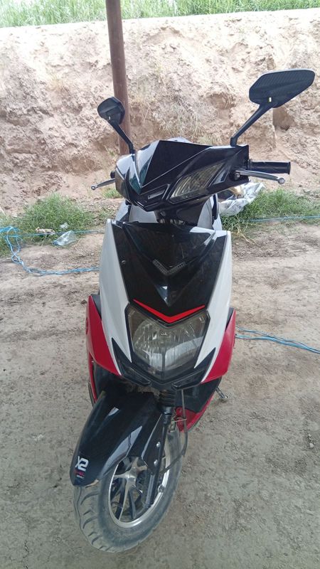 Скутер "Kawasaki" Скутер "Kawasaki"