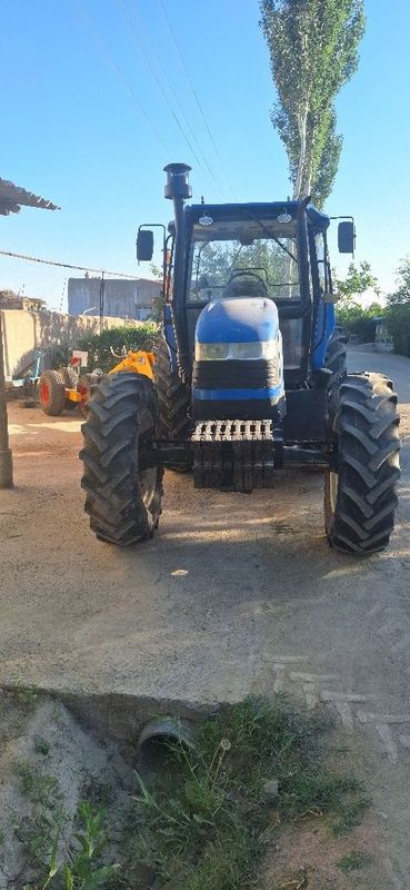 New holland Ts 135 Трактори ва лазерни йер текислаш дилнавози сотилади New holland Ts 135 Трактори ва лазерни йер текислаш дилнавози сотилади