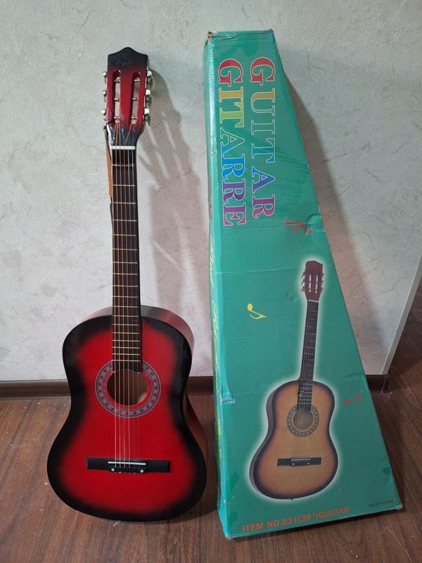 Gitara sotiladi 50$ ga bervoraman yangi hali endi 1 oy ishlatilga Gitara sotiladi 50$ ga bervoraman yangi hali endi 1 oy ishlatilga