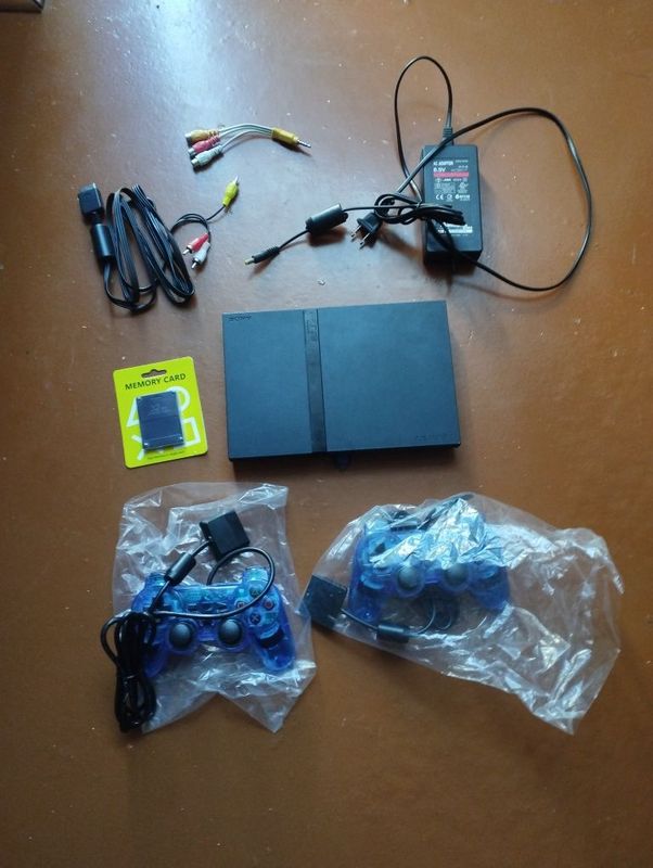 PS2 slim playstation2 sotiladi +bonusga TV PS2 slim playstation2 sotiladi +bonusga TV