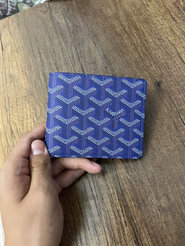 Портмане Goyard.