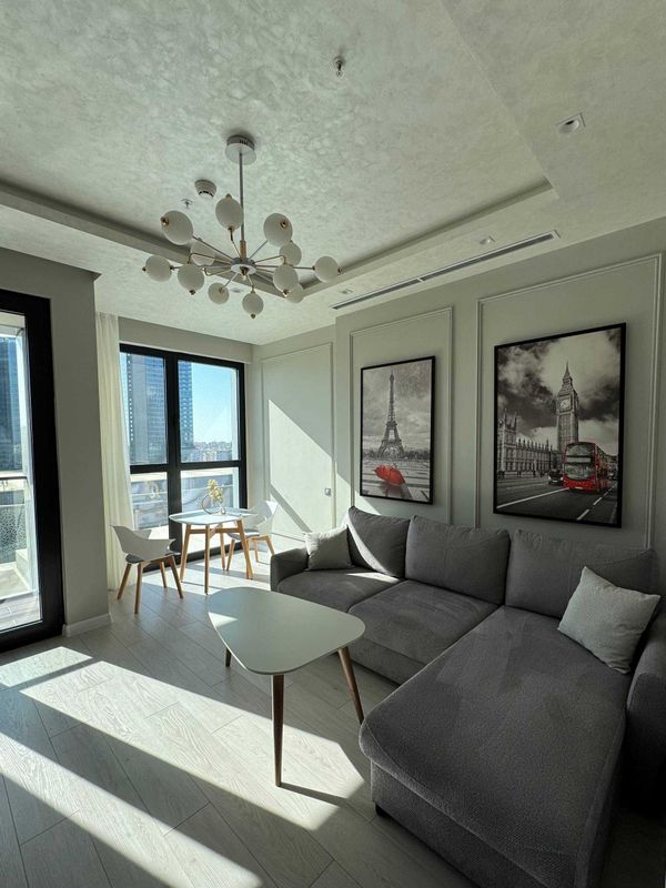 Посуточно квартира в Nest One с видом на Tashkent City Park и балконом Посуточно квартира в Nest One с видом на Tashkent City Park и балконом