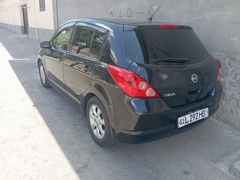 Ниссан Тиида 1,6л, 110л.с., АКПП, 2006г. Ниссан Тиида 1,6л, 110л.с., АКПП, 2006г.