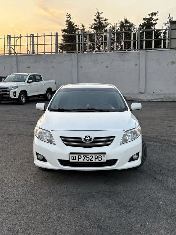 Tayota carolla 1.8L oq rangi zo'r holatda Tayota carolla 1.8L oq rangi zo'r holatda