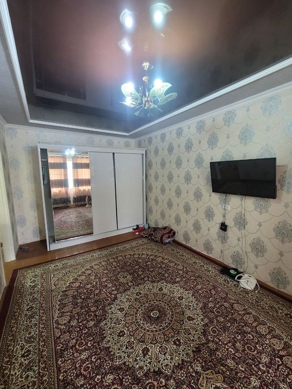 1 xonalik 6mkr muzikalniyni orqasida joylashgan