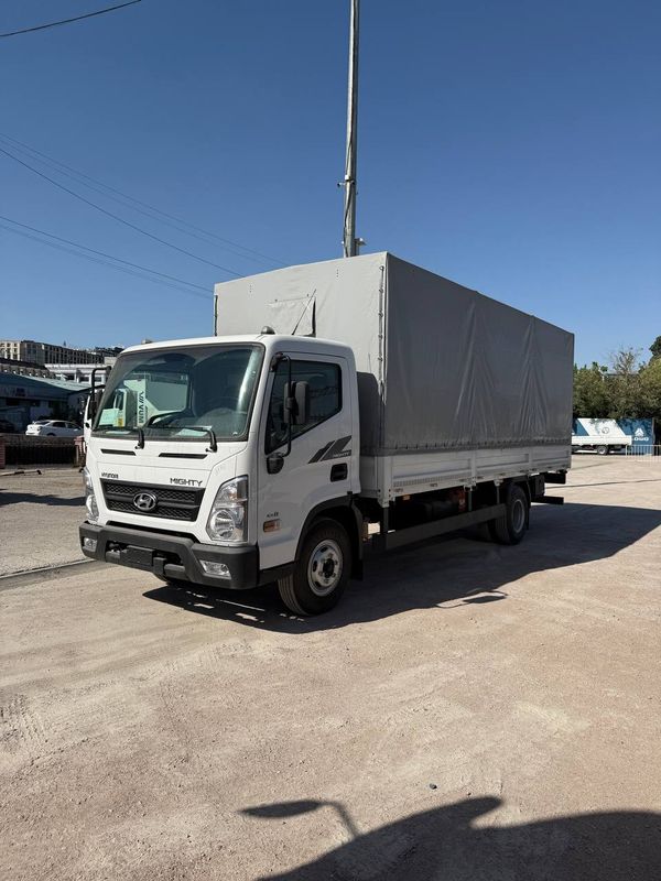 Бортовой тентовый  фургон HYUNDAI EX8