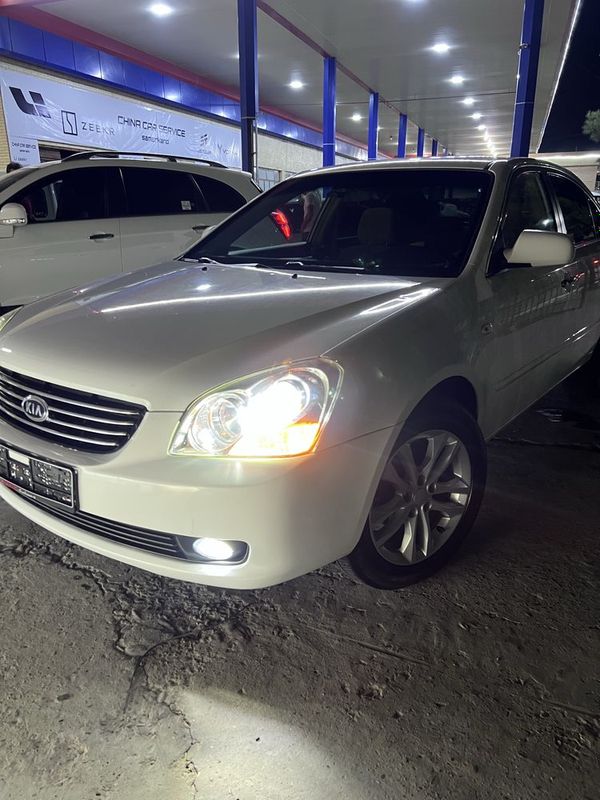 Kia optima Oq rangda 2007 yil