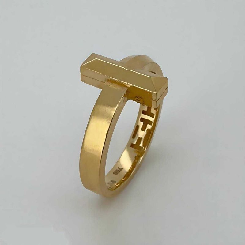 Элегантное золотое кольцо в стиле TIFFANY с пробой 750. Элегантное золотое кольцо в стиле TIFFANY с пробой 750.