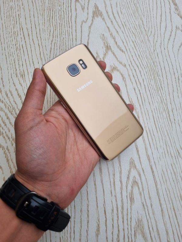 Samsung Galaxy S7 duos Gold. Joyi 64 GB. Legendarniy ideal/Yaxshi. Samsung Galaxy S7 duos Gold. Joyi 64 GB. Legendarniy ideal/Yaxshi.