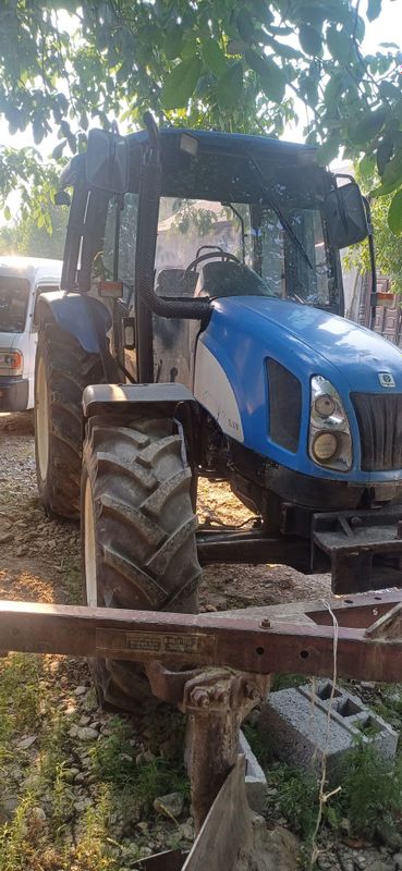 New Holland-100 yili 2005 yil New Holland-100 yili 2005 yil